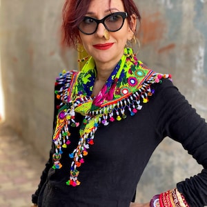 Colorful scarf with a fringe of tassels and beadwork. image 1