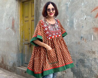 Cotton kaftan featuring rare Indian embroidery neckline. Cotton floral in tan with green and orange highlight shades in the colorful bodice