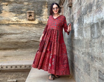 Red midi dress of hand dyed block prints. It’s an Indian dress from pure cotton Ajrakh.