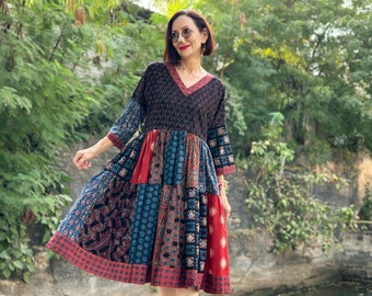A colorful patchwork dress of hand dyed cottons.