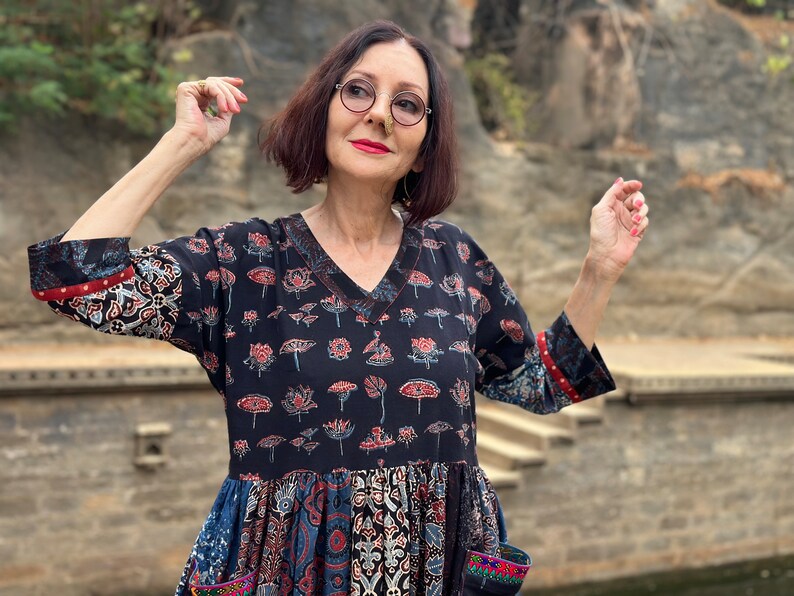 A wearable art dress of hand dyed cottons. An Individual design, highlighted with colorful Indian hand embroidery decorating the pockets image 8