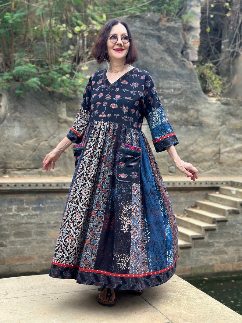 A wearable art dress of hand dyed cottons. An Individual design, highlighted with colorful Indian hand embroidery decorating the pockets image 3