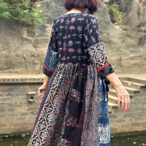 A wearable art dress of hand dyed cottons. An Individual design, highlighted with colorful Indian hand embroidery decorating the pockets image 9