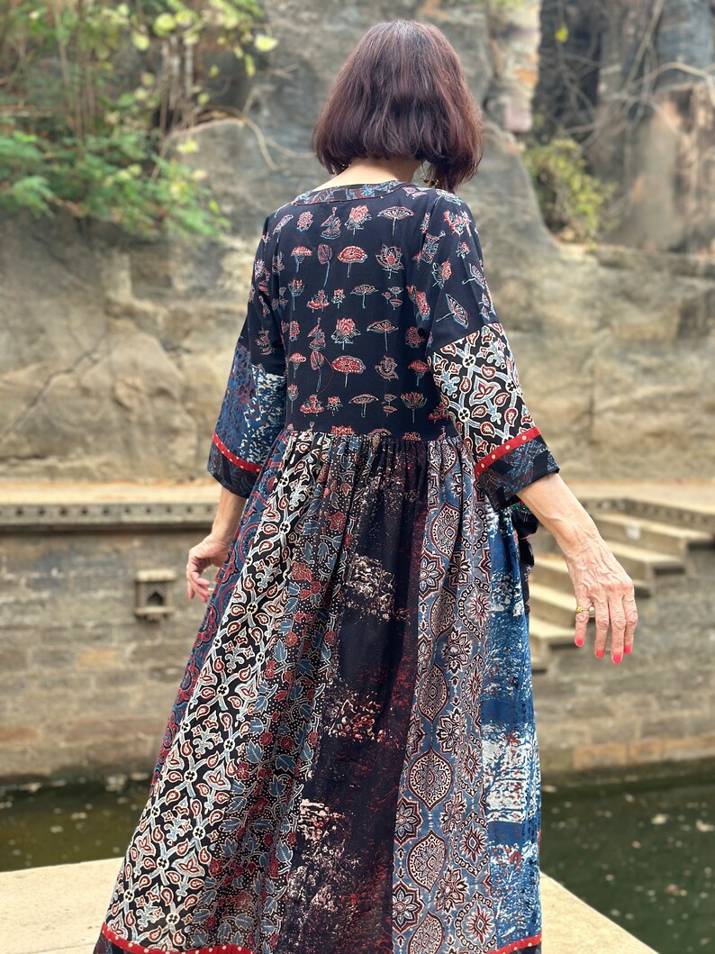 A wearable art dress of hand dyed cottons. An Individual design, highlighted with colorful Indian hand embroidery decorating the pockets image 9