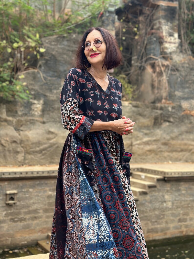 A wearable art dress of hand dyed cottons. An Individual design, highlighted with colorful Indian hand embroidery decorating the pockets image 5