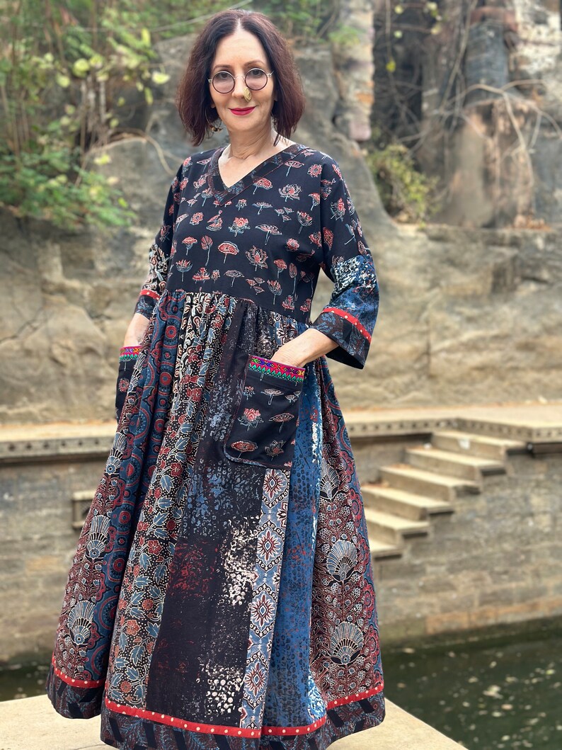 A wearable art dress of hand dyed cottons. An Individual design, highlighted with colorful Indian hand embroidery decorating the pockets image 2
