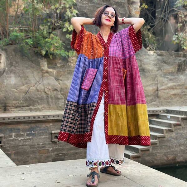 Colorful Kaftan from lightweight cotton. Red, pink, orange and purple create resort style glamour.