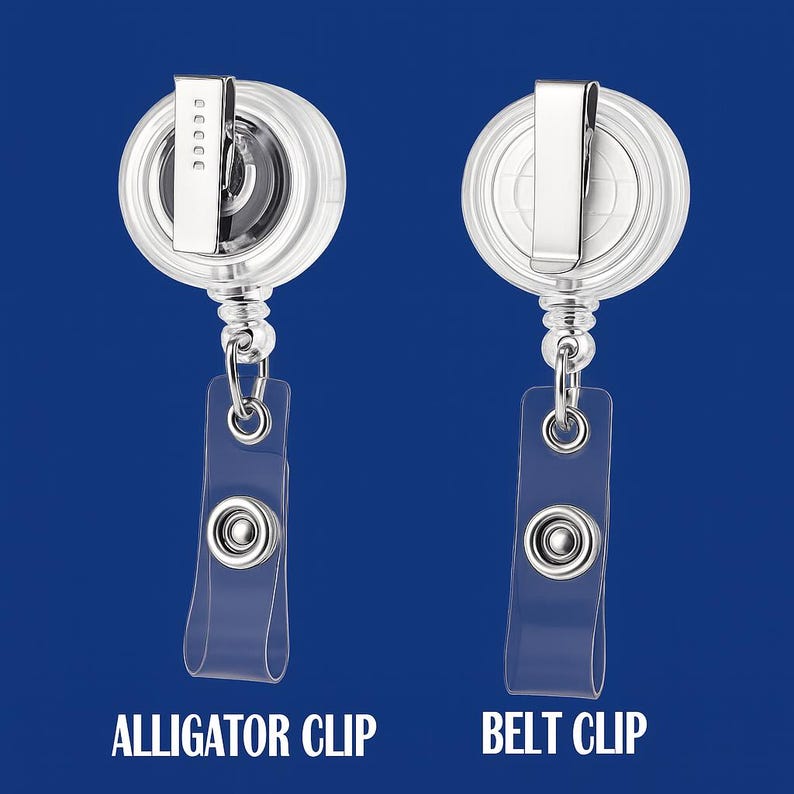 May include: Two clear retractable badge holders with silver detailing. One has an alligator clip, and the other has a belt clip. The text "ALLIGATOR CLIP" and "BELT CLIP" are printed below the holders.