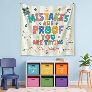 May include: A rectangular wall tapestry featuring a light green and white striped background with the text "MISTAKES ARE PROOF YOU ARE TRYING" in colorful letters, "Mrs. Johnson" in script, and various math symbols and icons.