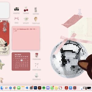 May include: Aesthetic desktop background with a light pink theme. Features a disco ball, cherries, a calendar, and a cartoon illustration. Includes the text "direction your true heart".