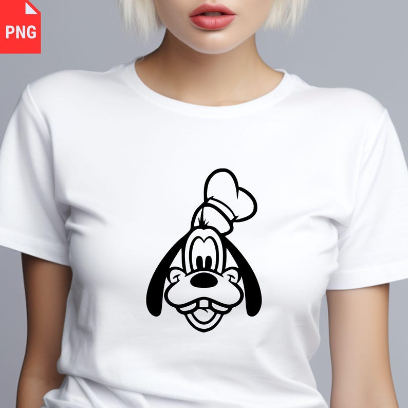May include: White t-shirt featuring a black and white graphic of a cartoon dog's face. The dog has large ears, a smiling mouth, and a chef's hat. The design is centered on the shirt.