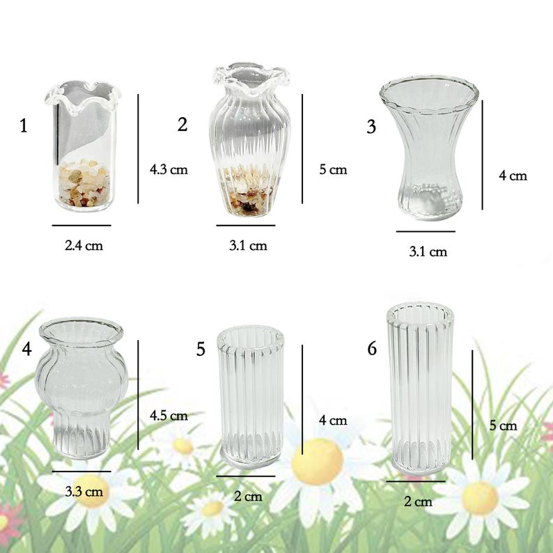 May include: A collection of six small, clear glass vases of varying shapes and sizes. Measurements are provided in centimeters. The vases are displayed against a backdrop of white daisies and green foliage.