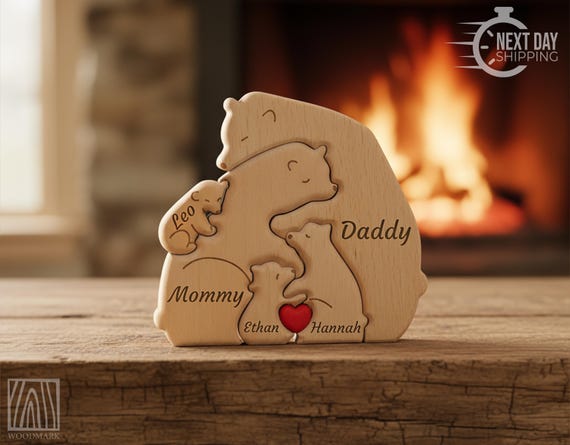 Engraved hugging bear family puzzle where each bear is labeled with a family member's name — 424 favorites confirm it's a genuinely sweet, giftable keepsake.