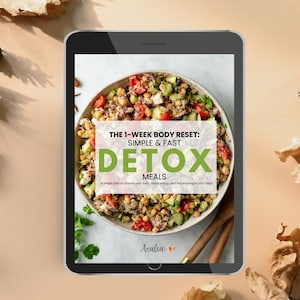 May include: A digital tablet displays a colorful salad in a white bowl. Text on the screen reads "The 1-Week Body Reset: Simple & Fast Detox Meals." The image is surrounded by a neutral background with dried leaves.