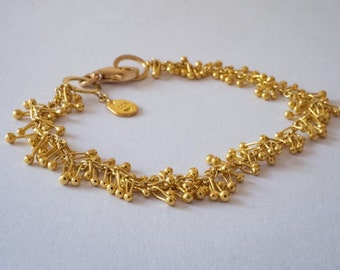 22k solid gold drops dancing on 18k  gold chain bracelet, handmade fine jewelry, resizable.