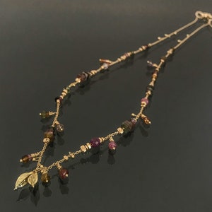 multi color tourmaline dancing with 18k solid gold seed pods & chain necklace, handmade fine jewelry.