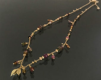 multi color tourmaline dancing with 18k solid gold seed pods & chain necklace, handmade fine jewelry.