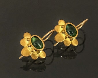 22k solid gold lotus earrings set with green tourmaline, handmade fine jewelry.