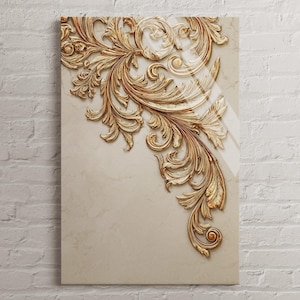 May include: A rectangular canvas print with a detailed, gold-coloured, ornate floral design in the upper left corner. The design has a 3D effect, with intricate swirls and leaf patterns. The background is a light beige colour, and the print is mounted on a white brick wall.