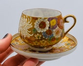 Vintage - Hand Painted -KOSHIDA Japan -Japanese Satsuma - Thousand Flowers - Millefiori Tea Cup Saucer Set - Gold Gilding and Moriage Enamel