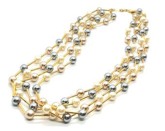 Vintage - Avon - Signed - 4 Strand Necklace -  Faux Pearls in Three Different Colors with Goldtone Buggle Bead Spacers