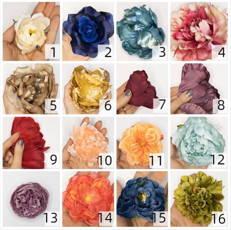 May include: Assortment of 16 artificial flower heads in various colors and styles, including peach, blue, red, gold, and green.