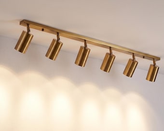 Lámpara de riel ajustable de latón, foco de techo minimalista de 6 luces.