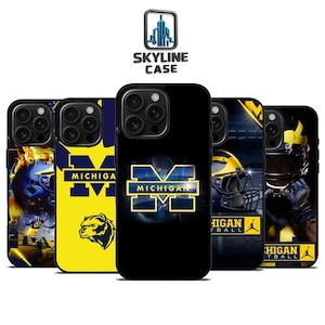 May include: A selection of black phone cases showcasing the University of Michigan's logo and football imagery. The cases feature the letter "M" in yellow and blue, the team name, and a wolverine mascot. The Skyline Case logo is visible at the top.