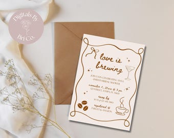 May include: A bridal shower invitation with the text "love is brewing" in a brown, decorative font. The invitation includes details for the event, such as the date, time, and location. A brown envelope is behind the invitation.