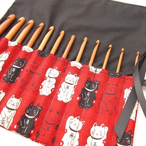 Lucky Cats Crochet set with bamboo hooks in a red storage case.