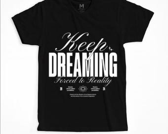 Keep Dreaming Zur Realität T-Shirt - Motivierendes Grafik-T-Shirt, inspirierende positive Denkweise und Belastbarkeit, erhebendes, inspirierendes Kleidungsstück