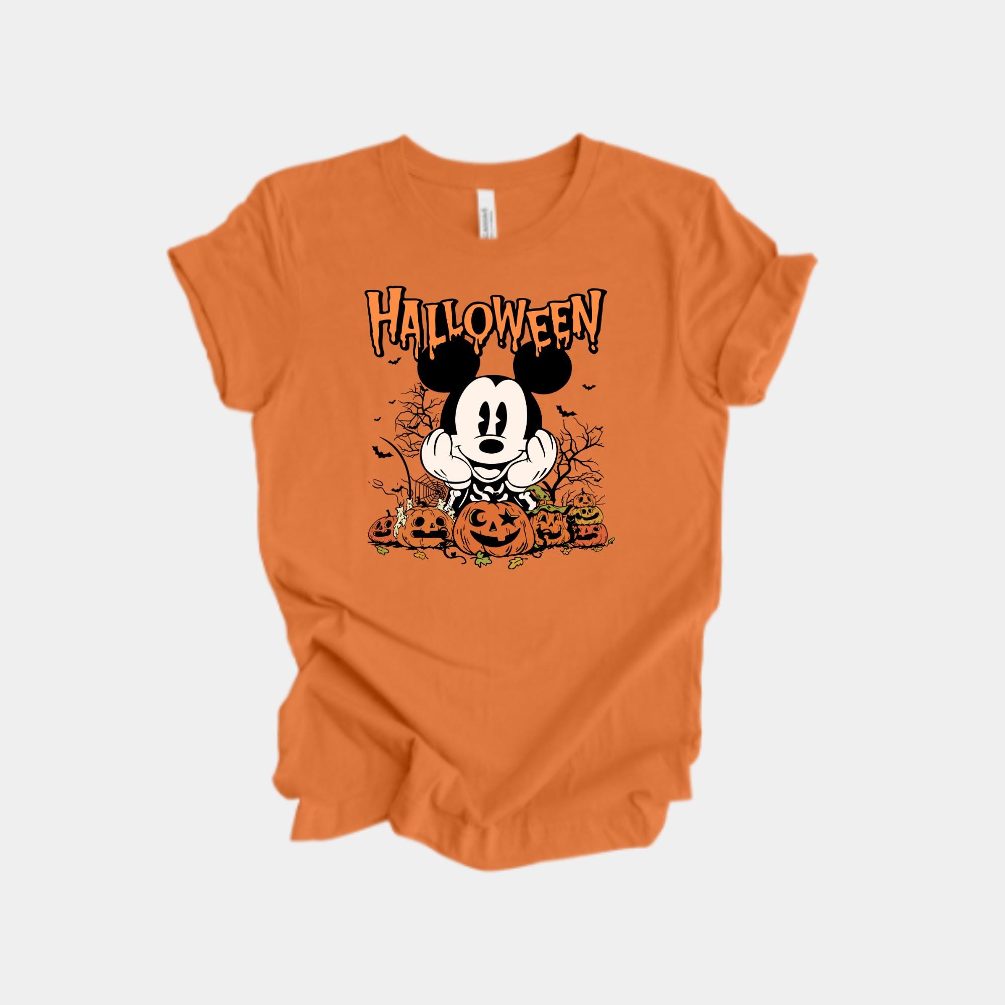 オレンジ色のハロウィンパンプキンTシャツ - かわいい漫画の 