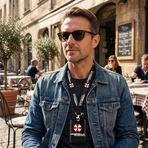Man wearing Umbrella Corporation lanyard and black badge holder, employee ID card case for work or events.
