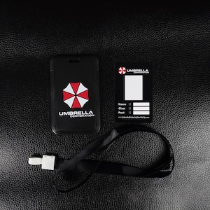 Black Umbrella badge holder with inner ID card and black neck lanyard, staff badge cover for office or con.