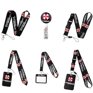 Umbrella Corporation lanyard bundle photo showing multiple strap styles and badge accessories on white background.