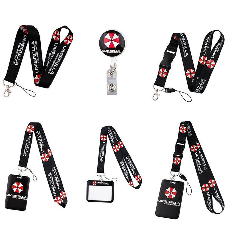 Umbrella Corporation lanyard bundle photo showing multiple strap styles and badge accessories on white background.
