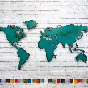 May include: A teal metal world map mounted on a white brick wall. The map is a detailed outline of the continents. A color palette of paint swatches is displayed at the bottom of the image.