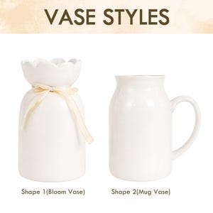 May include: Two white ceramic vases are displayed against a neutral background. The first, a Bloom Vase, has a scalloped top and is tied with a cream ribbon. The second, a Mug Vase, has a handle. Text above reads "VASE STYLES".