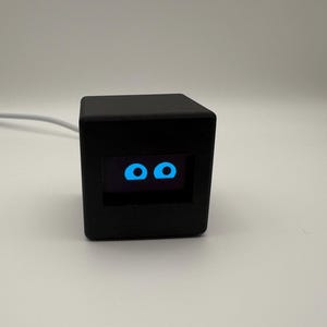 Mascota robot de escritorio y compañero tecnológico