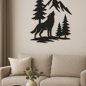 May include: Black metal wall art depicting a howling wolf in a forest scene with mountains. The silhouette features pine trees and a detailed wolf, suitable for rustic or nature-themed decor.