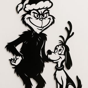 May include: A black and white silhouette of a character in a Santa hat, with a dog wearing antlers. The character has a grin and is touching the dog's head. The dog is smiling. Christmas theme.