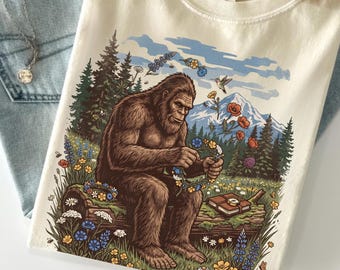 Bigfoot Wildflower Shirt, Sasquatch Nature Tee, Mountain Adventure Gift, Cryptid Forest Top.
