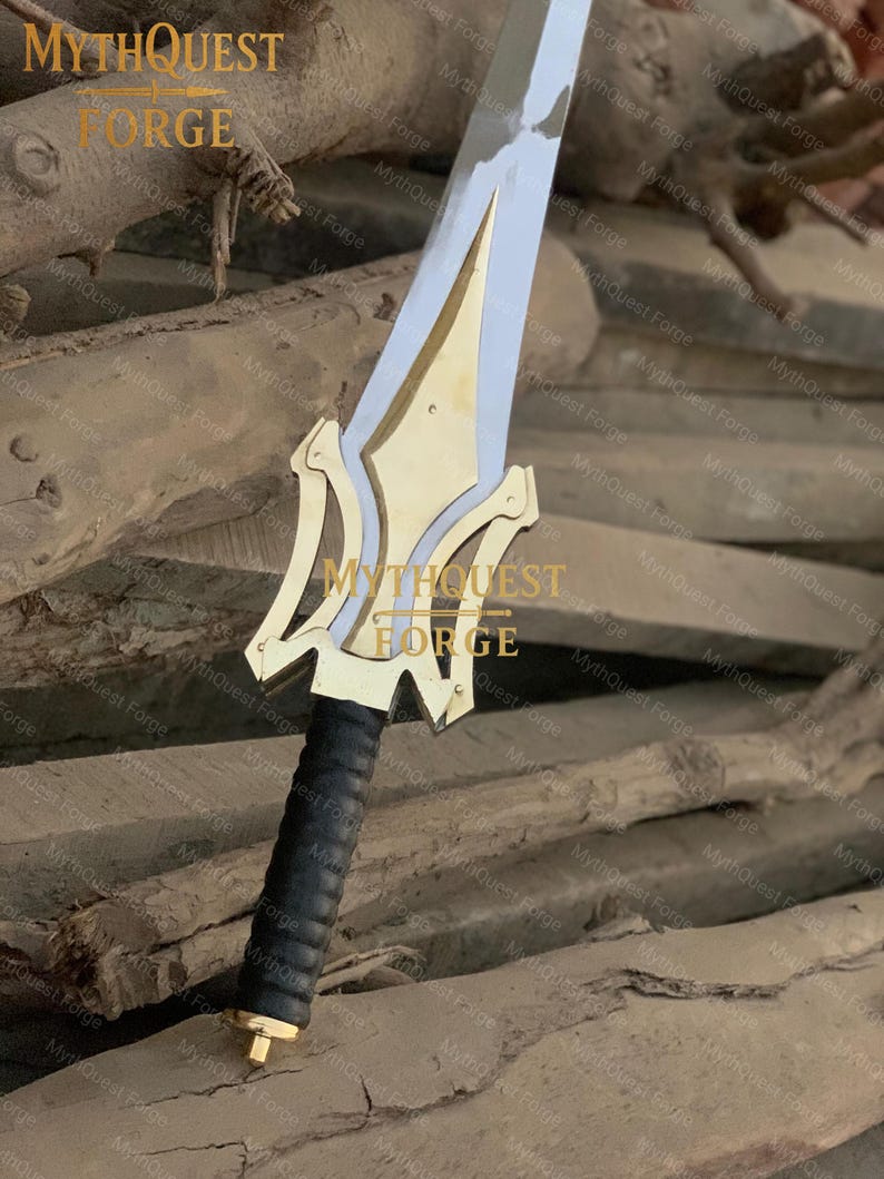 May include: A sword with a silver blade and gold-colored hilt. The hilt has a decorative design and a black, textured grip. The text "MYTHQUEST FORGE" is visible on the hilt.