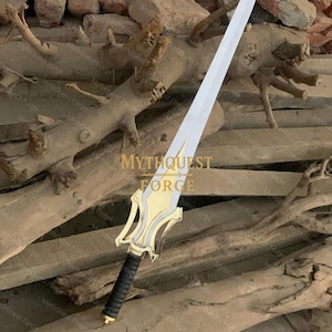 May include: A silver sword with a gold and silver hilt and a black handle. The sword is displayed on a background of wood and bricks. The text "MYTHQUEST FORGE" is visible in the image.