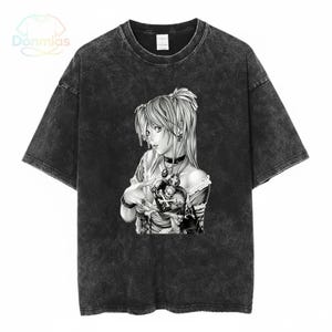May include: Dark gray, acid wash t-shirt featuring a black and white anime-style illustration of a female character. The graphic includes a choker, jewelry, and a detailed design. The shirt has short sleeves and a crew neck.
