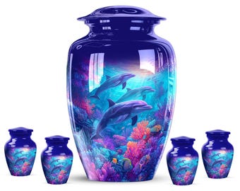 May include: A navy blue cremation urn and matching keepsake urns. The urns feature a vibrant underwater scene with dolphins, coral, and fish. The design is printed on the glossy surface of the urns.