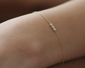 Sierlijke diamanten armband met 3 bezels in goud