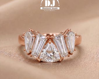 1.00 ct central trillion cut lab diamond with kite and tapered baguettes