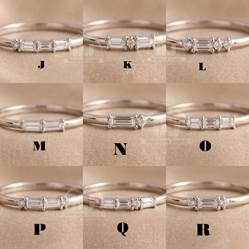 May include: Nine silver rings, each with a different design of baguette and round-cut gemstones. The rings are presented on a neutral backdrop, each labelled with a letter from J to R.