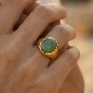 May include: A handmade wooden sign with the text "Welcome to our home" in a handwritten style. The sign is painted white with a distressed finish and a dark brown border. It is designed for indoor or outdoor use.